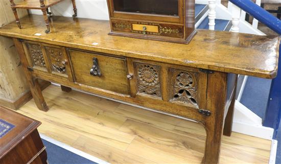 A Tudor style oak dresser base, W.202cm
